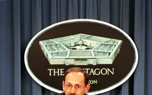 Under Secretary of Defense (Comptroller) Zakheim responds to a reporter's question during a press briefing.