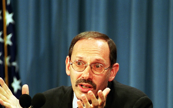 Under Secretary of Defense (Comptroller) Dov S. Zakheim responds to a reporter's question during a Pentagon press briefing.