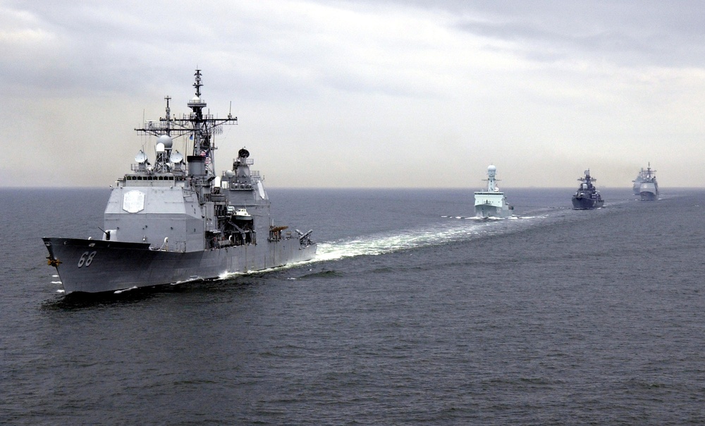 The USS Anzio (CG 68) leads a formation of ships in the Baltic Sea during Exercise Baltic Operations 2001.