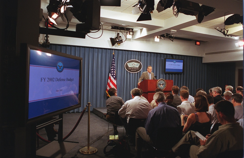 Secretary Rumsfeld begins his section of a briefing.