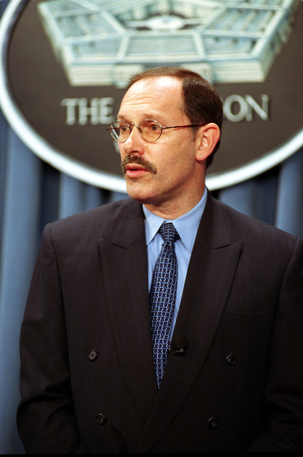 Under Secretary of Defense (Comptroller) Dov Zakheim responds to a question during a briefing.