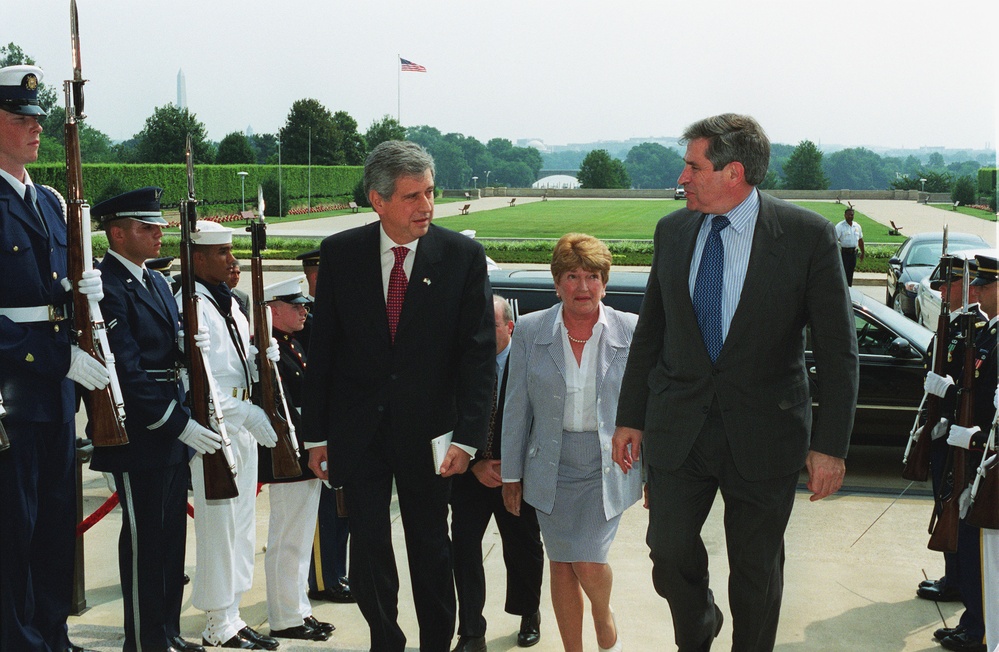 Vice Minister of Defense Angel Tello (left), of the Argentine Republic, is escorted into the Pentagon by Deputy Secretary Wolfowitz.