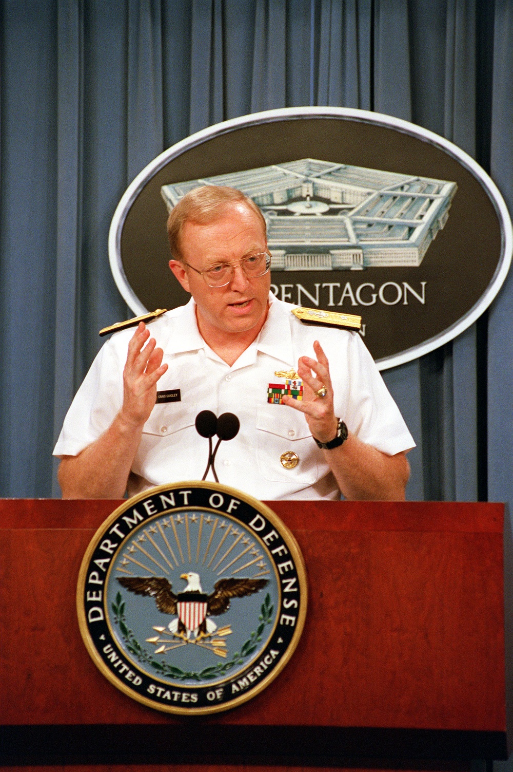 Rear Adm. Craig Quigley responds to a reporter's question during a Pentagon press briefing.