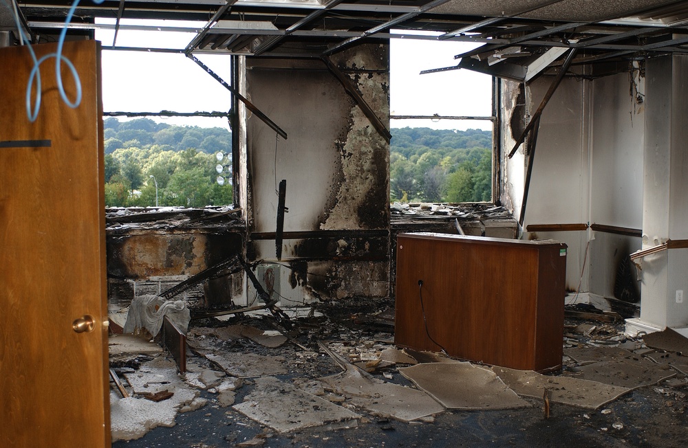 The effects of the blast and the fire caused when the hijacked American Airlines flight slammed into the Pentagon