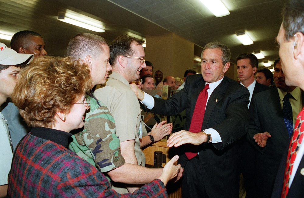 President George W. Bush pays a surprise visit to the Pentagon cafeteria.