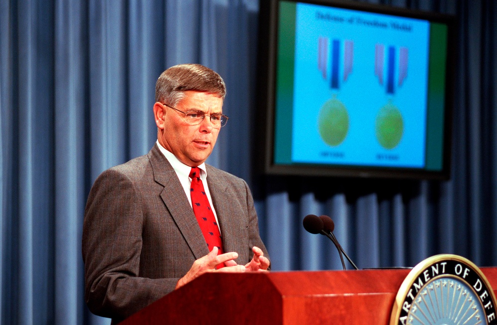 Assistant Secretary of Defense Abell explains the criteria for the Secretary of Defense Medal for the Defense of Freedom.