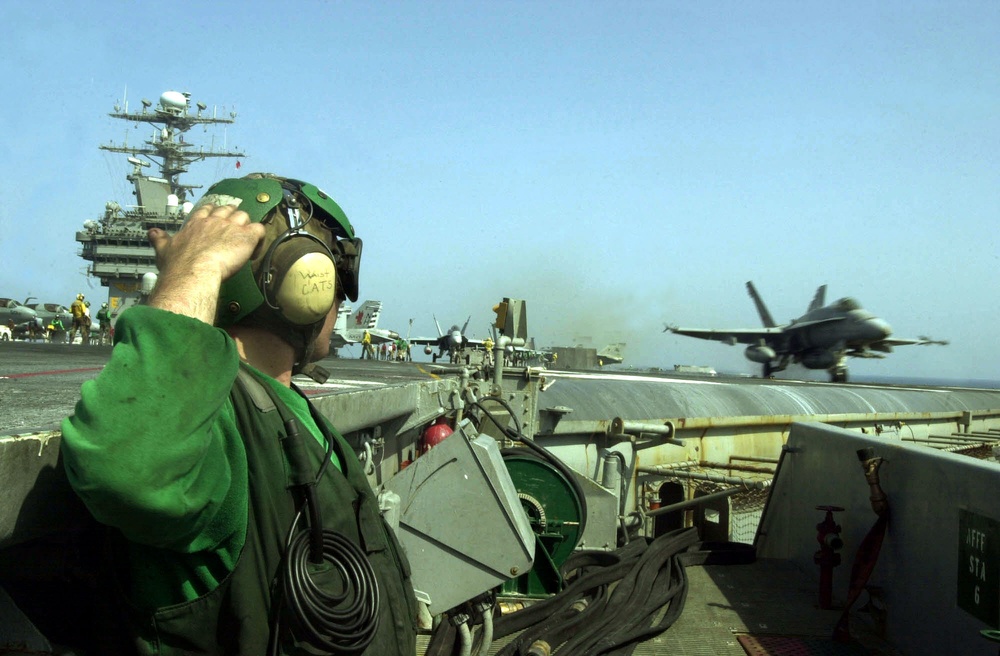 An F/A-18C Hornet is launched in a strike against al Qaeda terrorist training camps and military installations.
