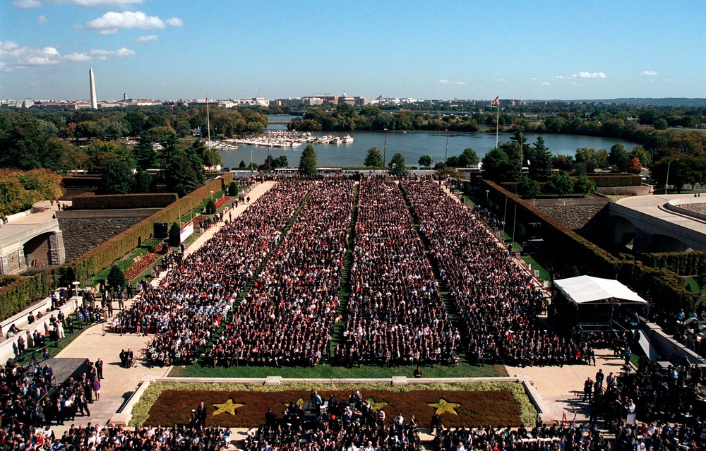 An audience of approximately 15,000 people fills the Pentagon River entrance.