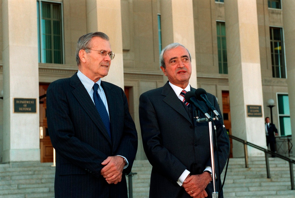 Italian Minister of Defense Martino answers a reporter's question during a media availability with Secretary Rumsfeld.