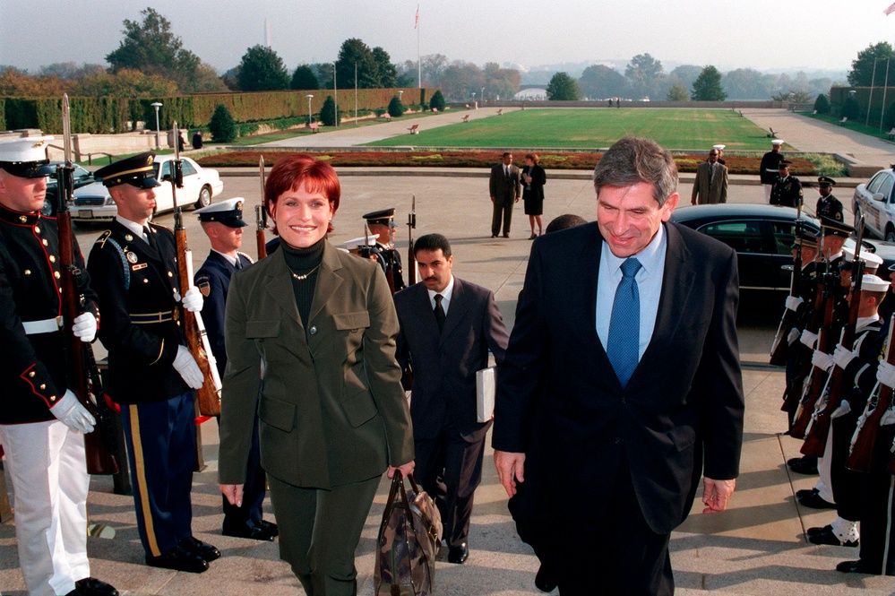 Deputy Secretary of Defense Wolfowitz escorts Princess Aisha bin al-Hussein into the Pentagon.