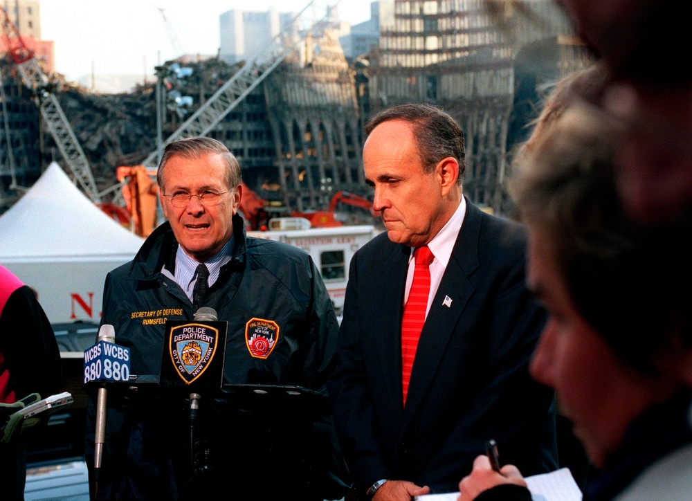 Secretary Rumsfeld and Mayor Giuliani hold a joint media availability at the site of the World Trade Center disaster.