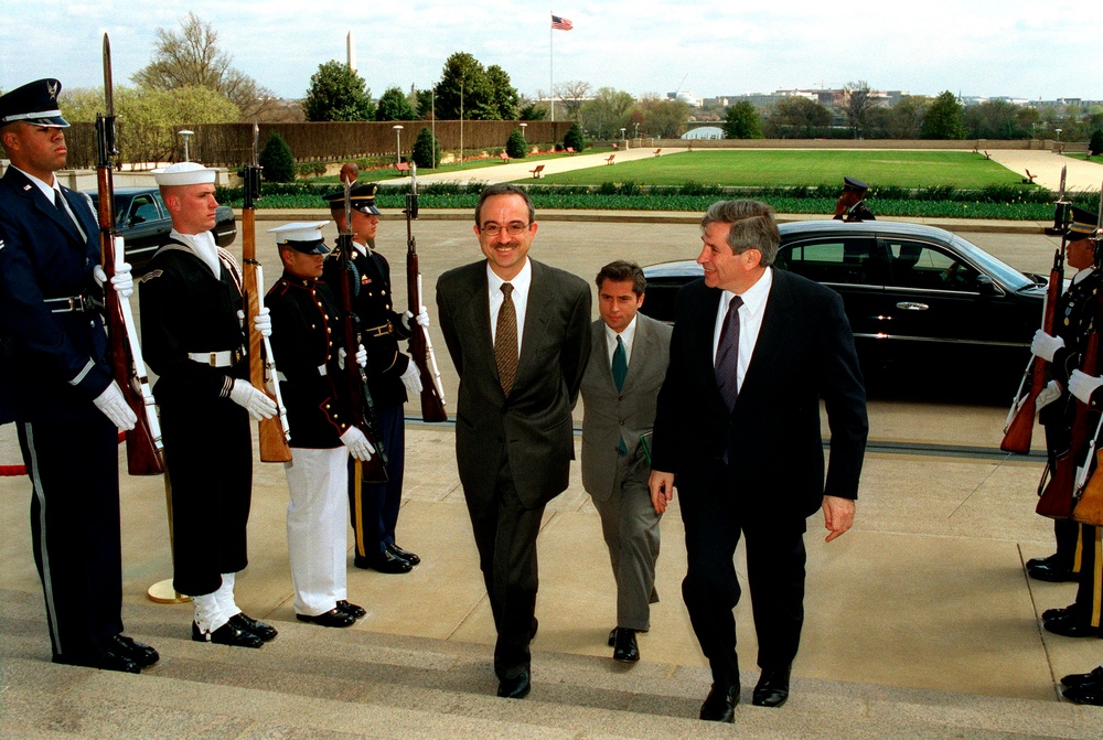 Jordanian Foreign Minister Marwan Muasher is escorted by Deputy Secretary Wolfowitz as he arrives at the Pentagon.