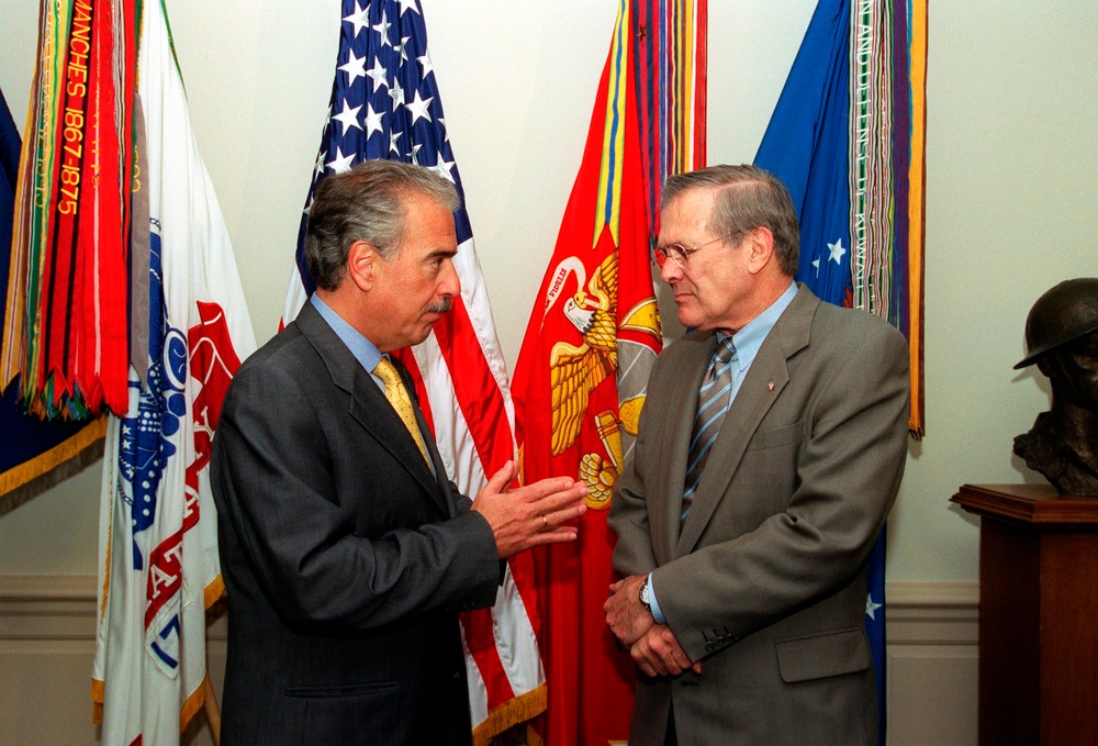 Colombian President Andres Pastrana speaks privately with Secretary Rumsfeld in the Pentagon.