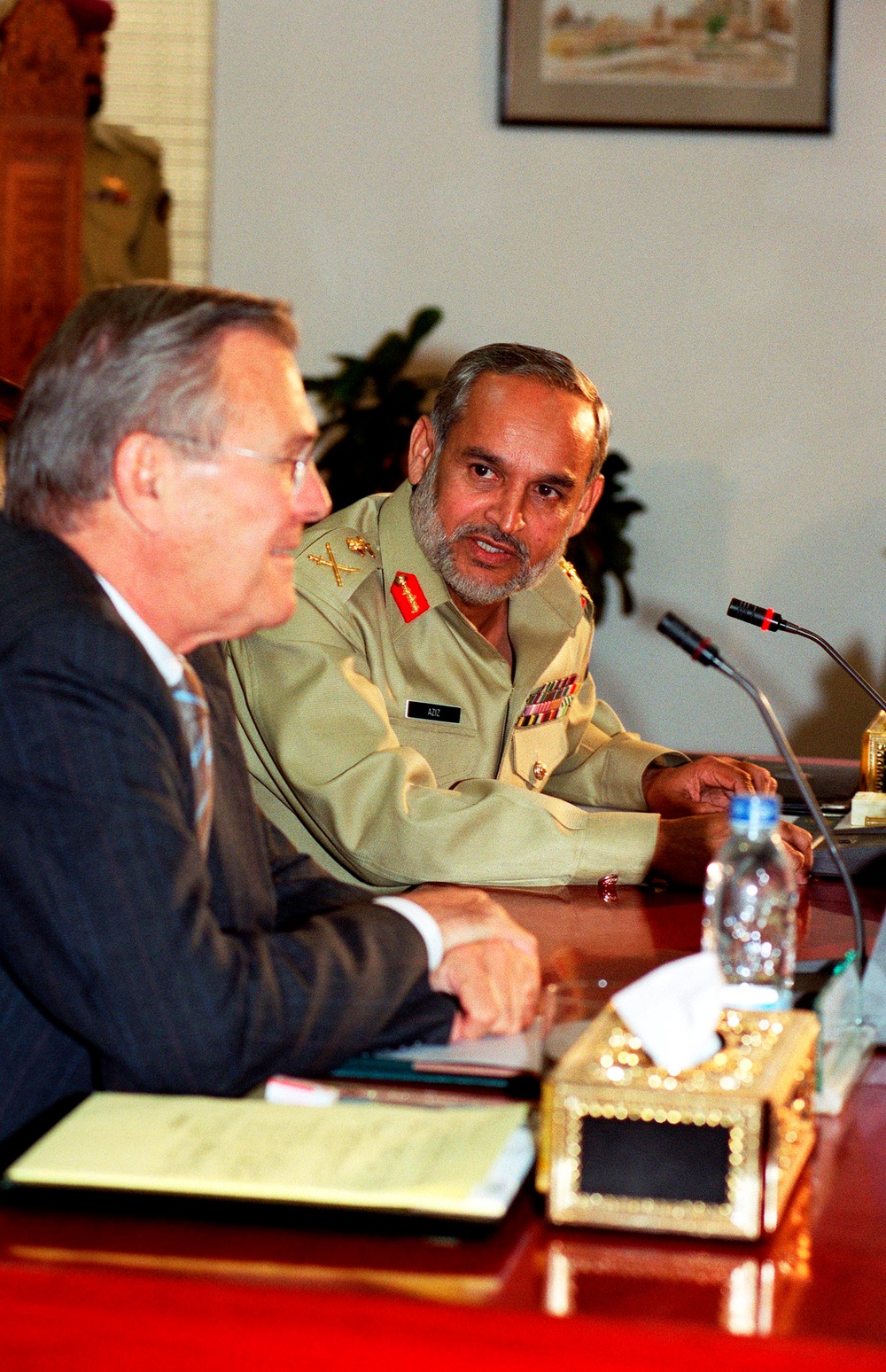 Gen. Aziz begins a bilateral meeting with Secretary Rumsfeld by welcoming him to Islamabad.
