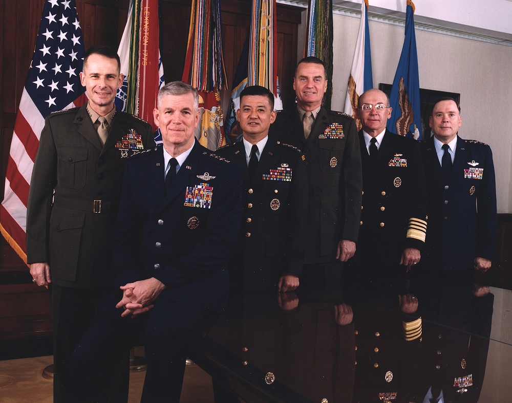 The Joint Chiefs of Staff photographed in the Joint Chiefs of Staff Gold Room (standing).