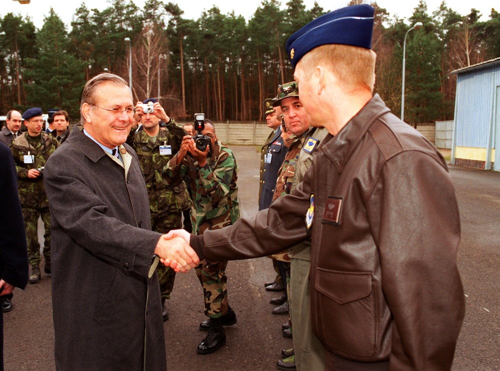 Secretary Rumsfeld greets one of the officers on temporary duty at the National Command Center Stara Boleslav.