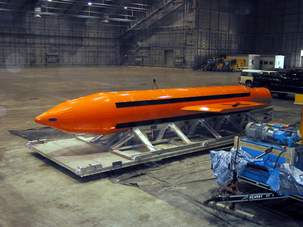 A Massive Ordnance Air Blast (MOAB) weapon is prepared for testing at the Eglin Air Force Armament Center.