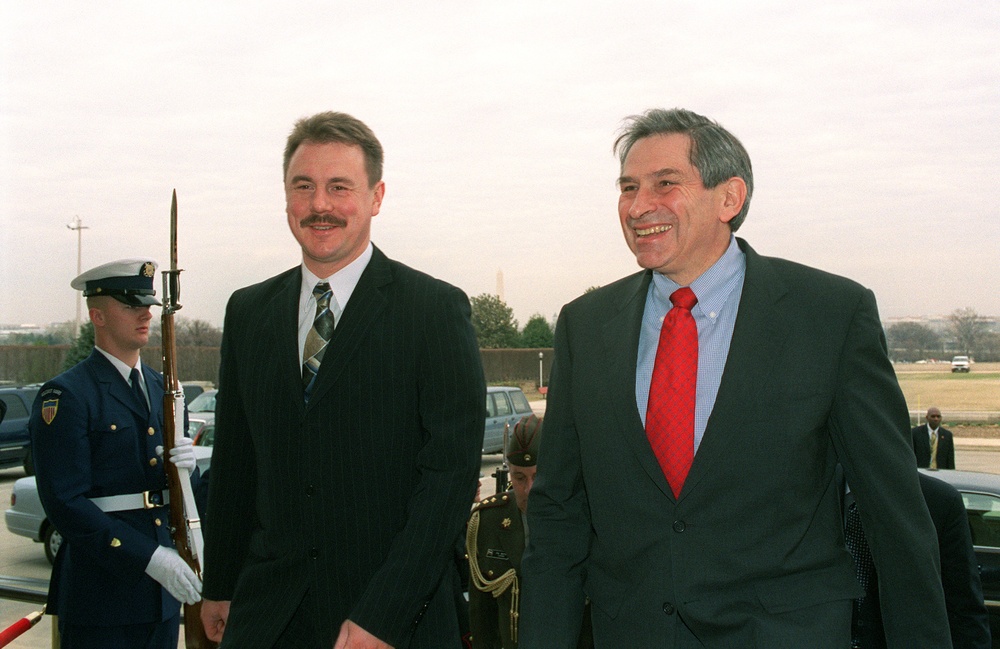 Deputy Secretary Wolfowitz escorts Latvian Minister of Defense Girts Valdis Kristovskis into the Pentagon.