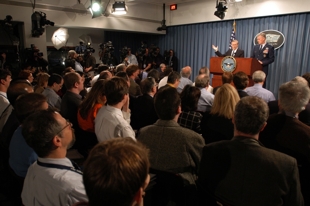 Secretary Rumsfeld cautions a room full of reporters that the conflict in Iraq is far from over.