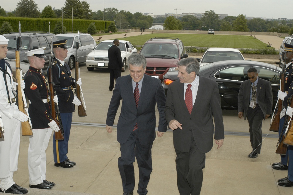Minister of Defense of Albania Majko is escorted into the Pentagon by Deputy Secretary Wolfowitz.