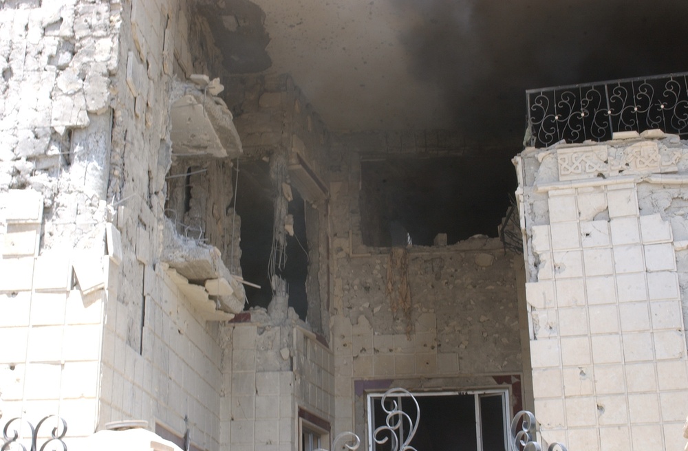The building that harbored Saddam Hussein's sons Qusay and Uday in Mosul, Iraq, shows the effects of the gun battle.
