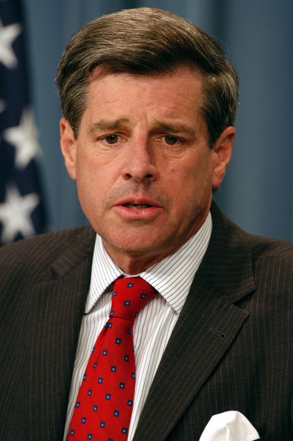 Ambassador Paul Bremer responds to a reporter's question during a Pentagon news briefing.