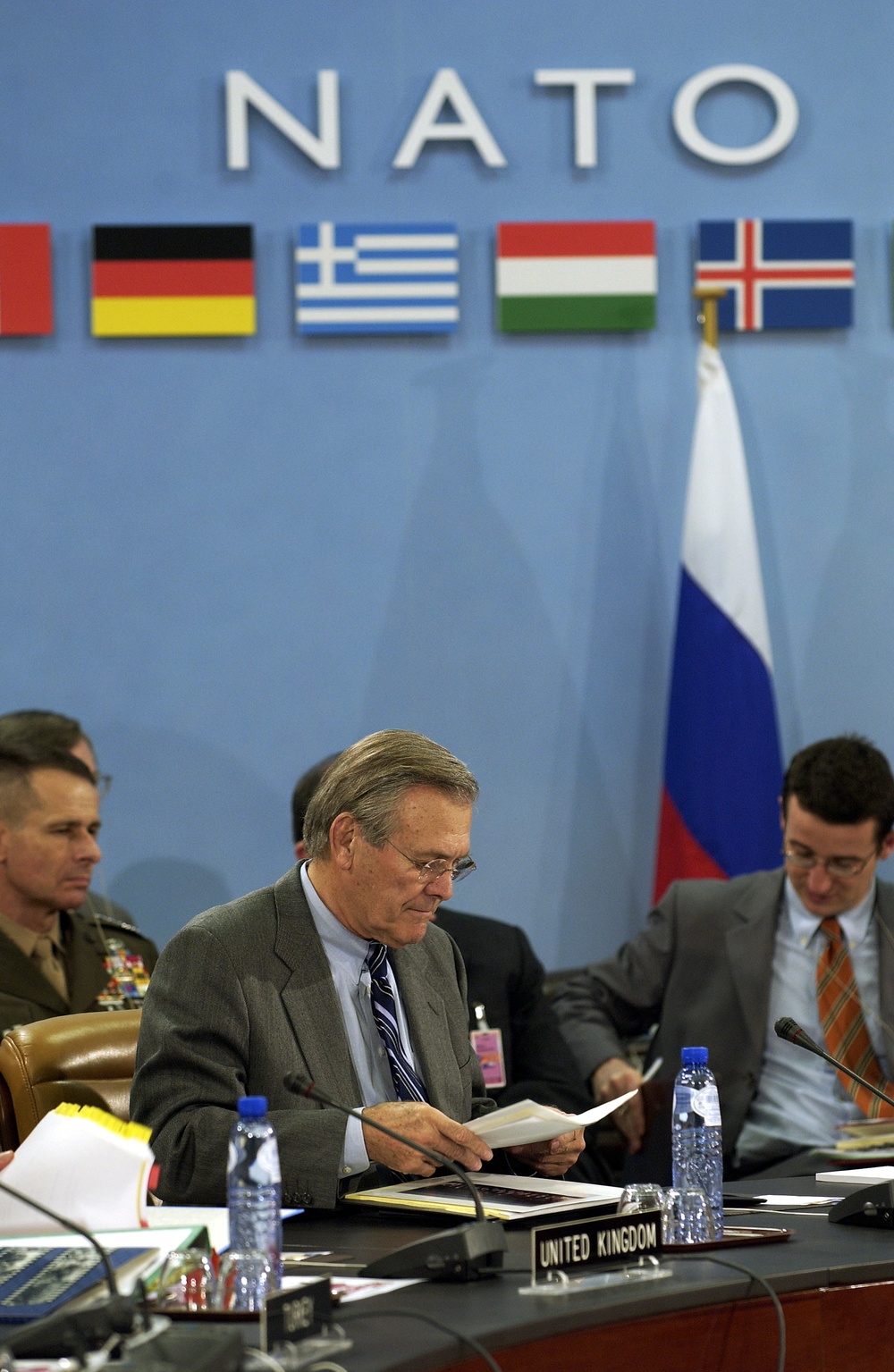 Secretary Rumsfeld prepares for a meeting of NATO defense ministers in Brussels, Belgium.