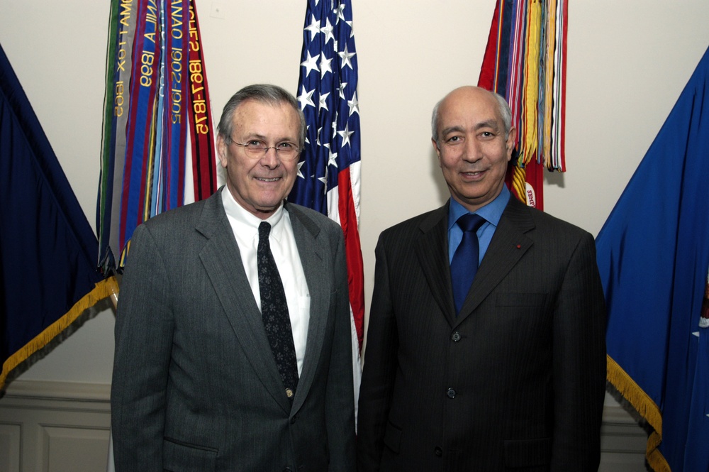 Secretary Rumsfeld and Prime Minister Driss Jettou, of Morocco, pose for photographs prior to their meeting.