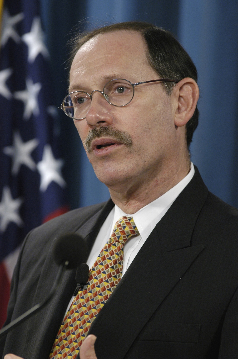 Dov Zakheim presents the Department of Defense budget during a Pentagon briefing.