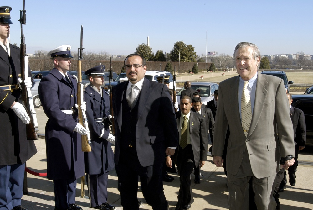 Secretary Rumsfeld escorts Bahrain's Crown Prince Salman bin Hamad Al-Khalifa through an honor cordon and into the Pentagon.