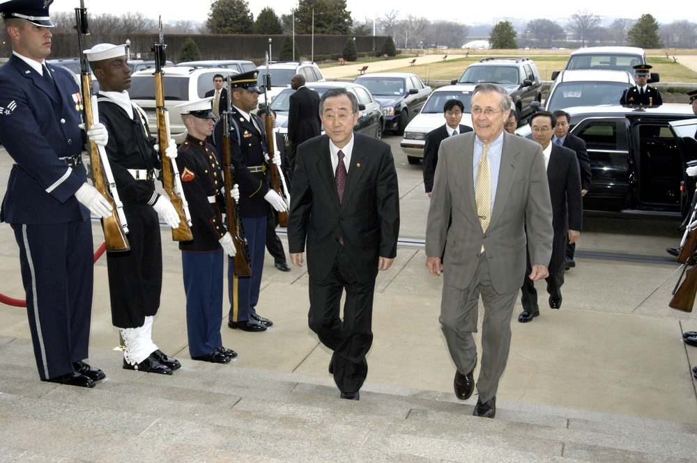 South Korean Minister of Foreign Affairs Ban Ki-moon is escorted through an honor cordon by Secretary Rumsfeld.