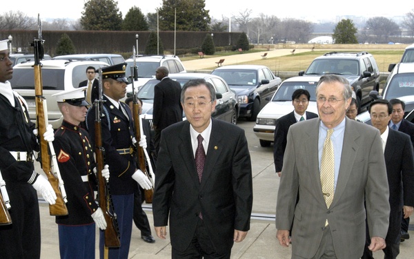 South Korean Minister of Foreign Affairs Ban Ki-moon is escorted through an honor cordon by Secretary Rumsfeld.