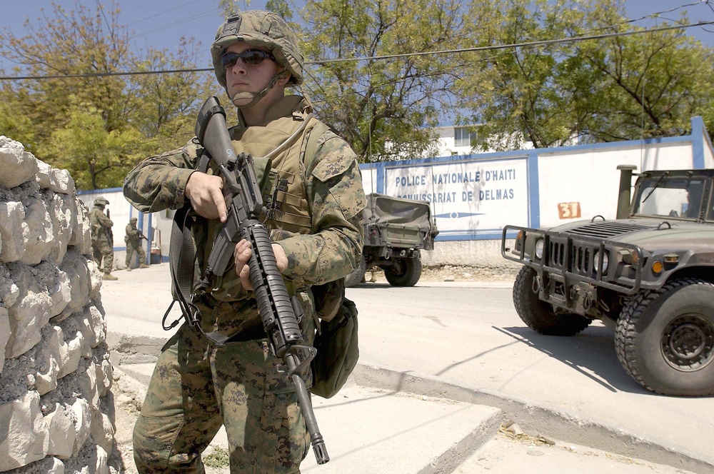 U.S. Marines provide security at Haitian police stations in Port-au-Prince, Haiti.