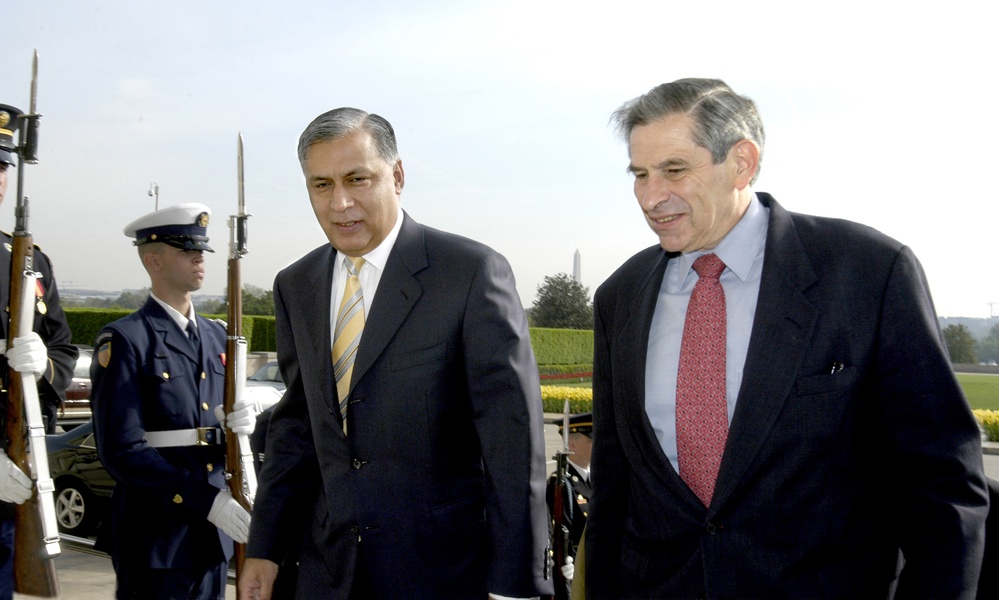 Pakistani Minister of Finance and Economic Affairs Shaukat Aziz and Deputy Secretary Wolfowitz walk into the Pentagon.