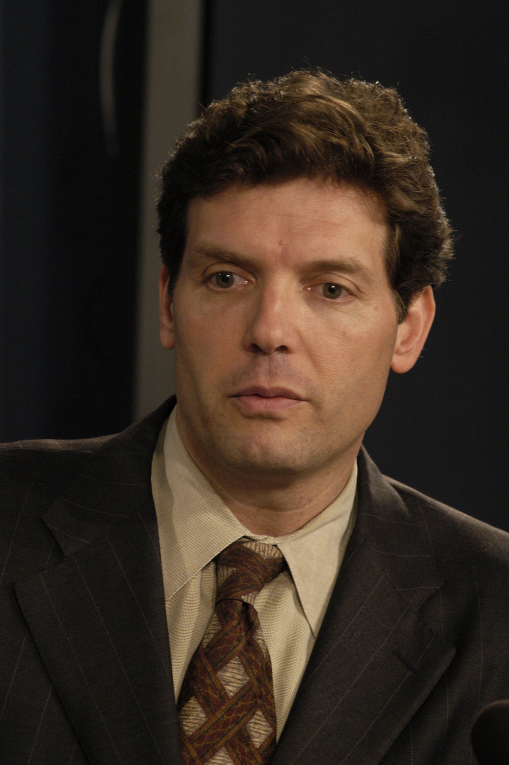 Principal Deputy Assistant Secretary of Defense for Public Affairs Larry Di Rita responds to a reporter's question.