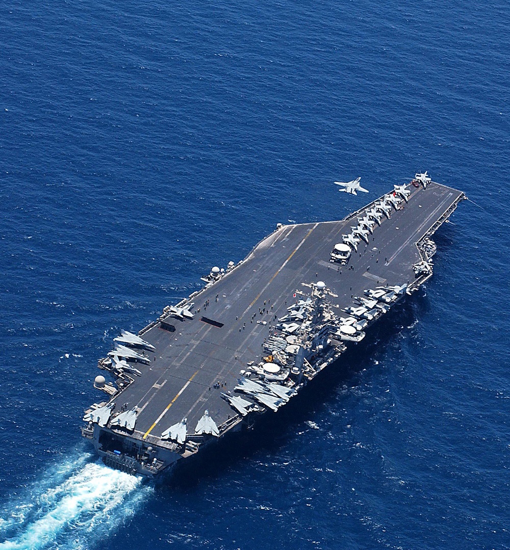 An F-14B Tomcat launches from the flight deck of the aircraft carrier USS George Washington (CVN 73).