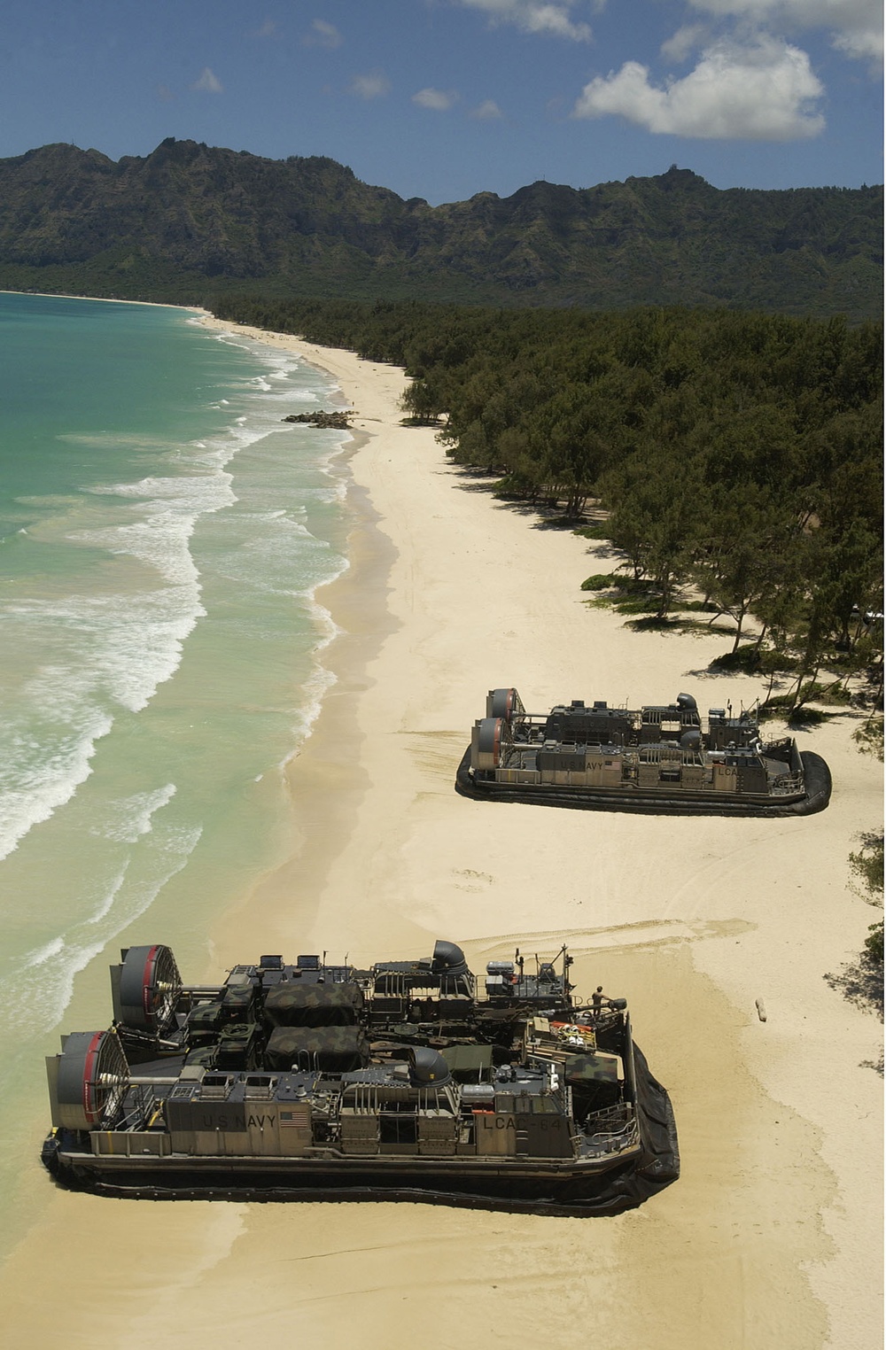Landing Craft, Air Cushioned vessels land on the beach to offload equipment and Marines.