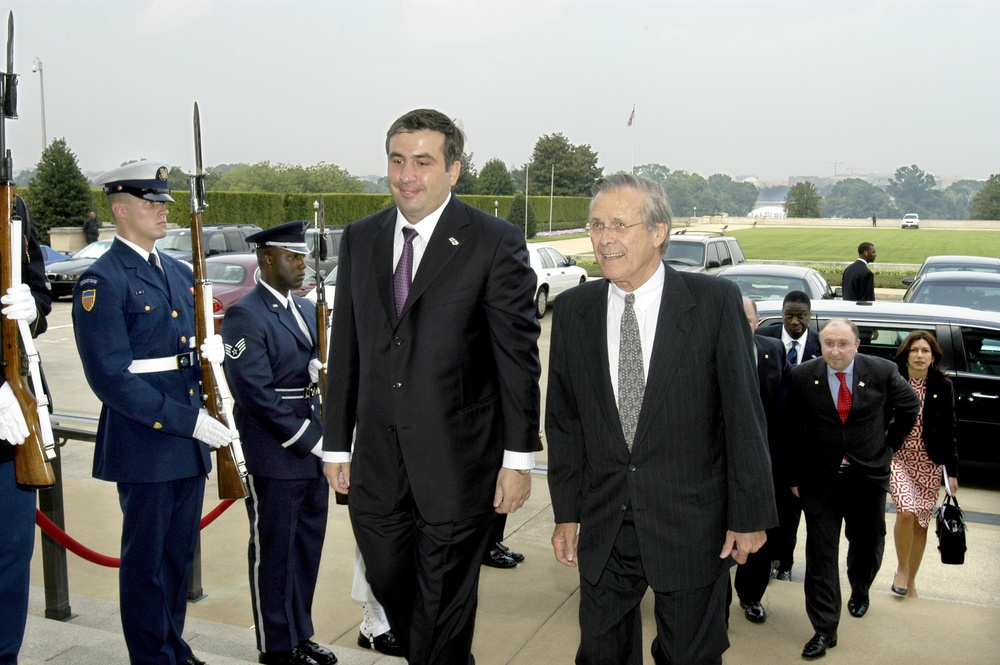 Secretary Rumsfeld escorts Georgian President Misha Saakashvili into the Pentagon.