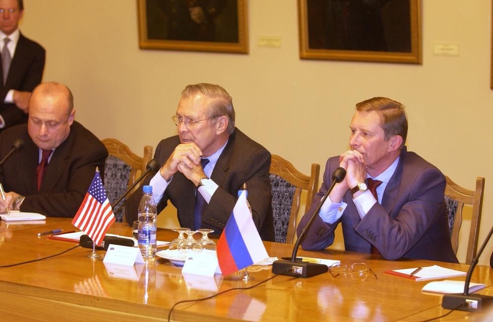 Secretary Rumsfeld and Russian Minister of Defense Sergey Ivanov listen to a reporter's question.