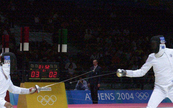 Second Lt. Weston Kelsey duels for advancement against Russian Ivan Tourchine.