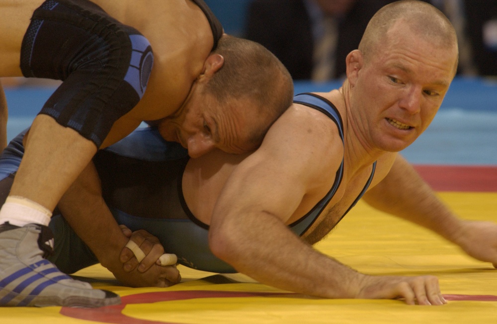 Sgt. Oscar Wood wrestles in the second pool round of the 66kg Greco-Roman wrestling.