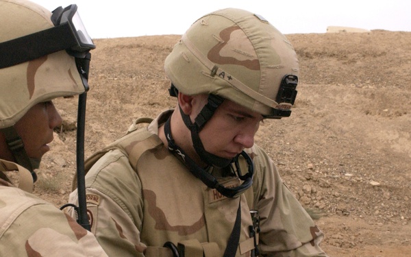 Staff Sgt. Huffman and Senior Airman Williams acquire Global Positioning Systems coordinates.