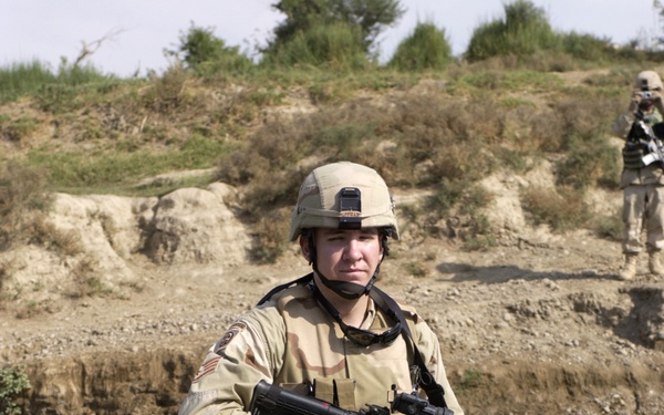 Air Force Staff Sgt. Michael Huffman crosses the Tigris River.