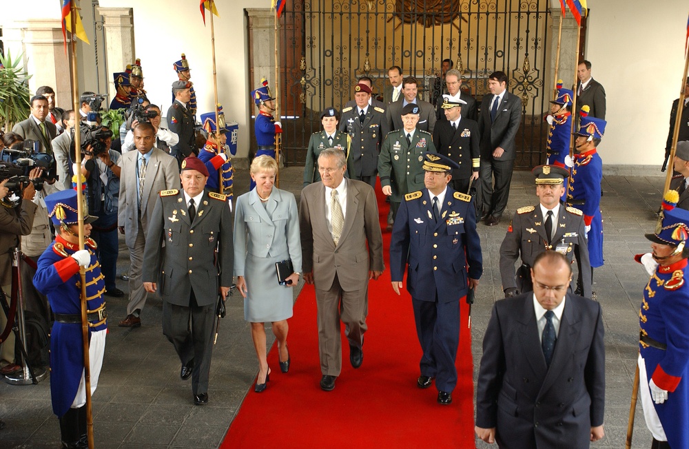 Leaders of the Ecuadorian military escort Secretary Rumsfeld and U.S. Ambassador to Ecuador Kenney.