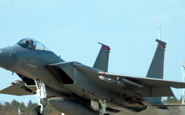 A U.S. Air Force F-15 Eagle aircraft takes off for a mission.