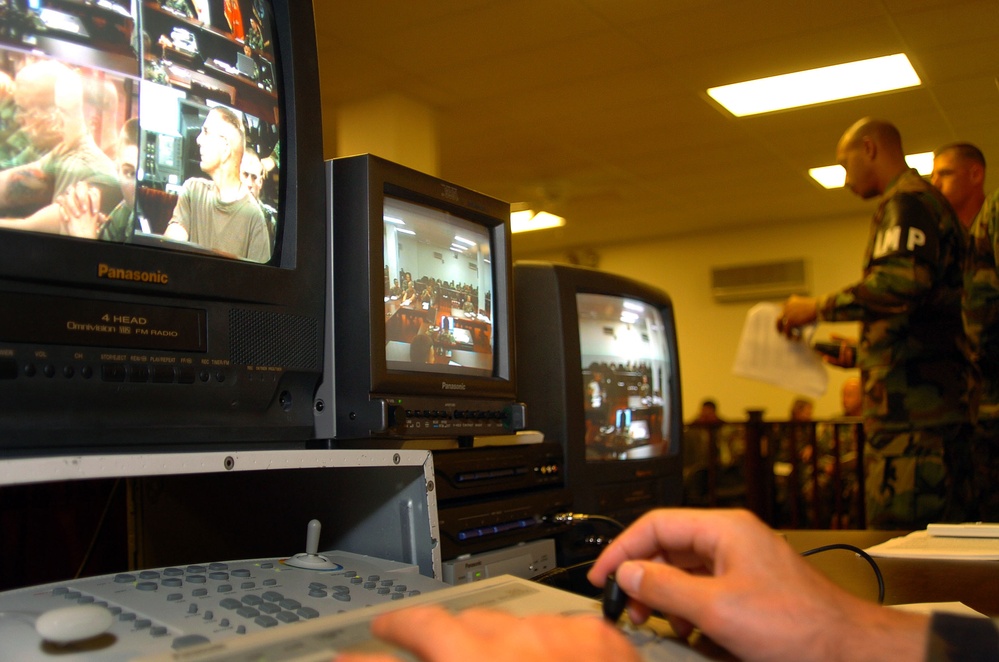 A closed-circuit television system is tested during a commissions rehearsal.