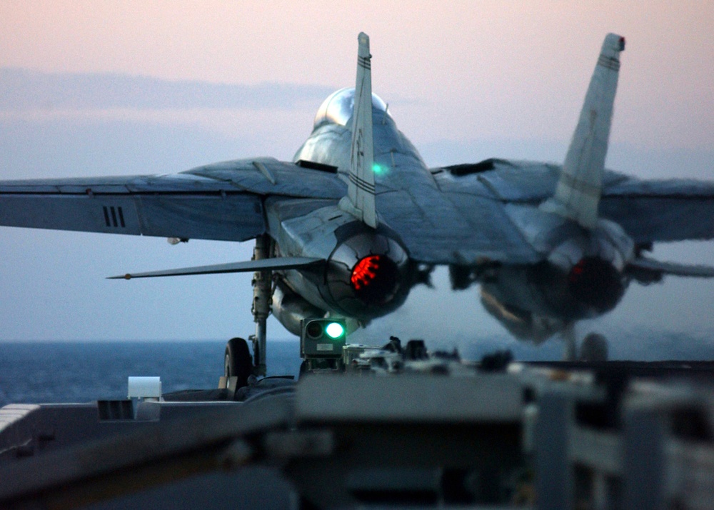 An F-14B Tomcat is catapulted from the flight deck of the aircraft carrier USS Harry S. Truman (CVN 75).