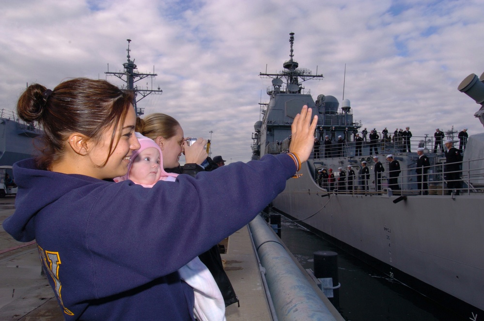 Veronica Rand, Theresa Trowbridge , and goddaughter Kyrsten Trowbridge wave good-bye from the pier.