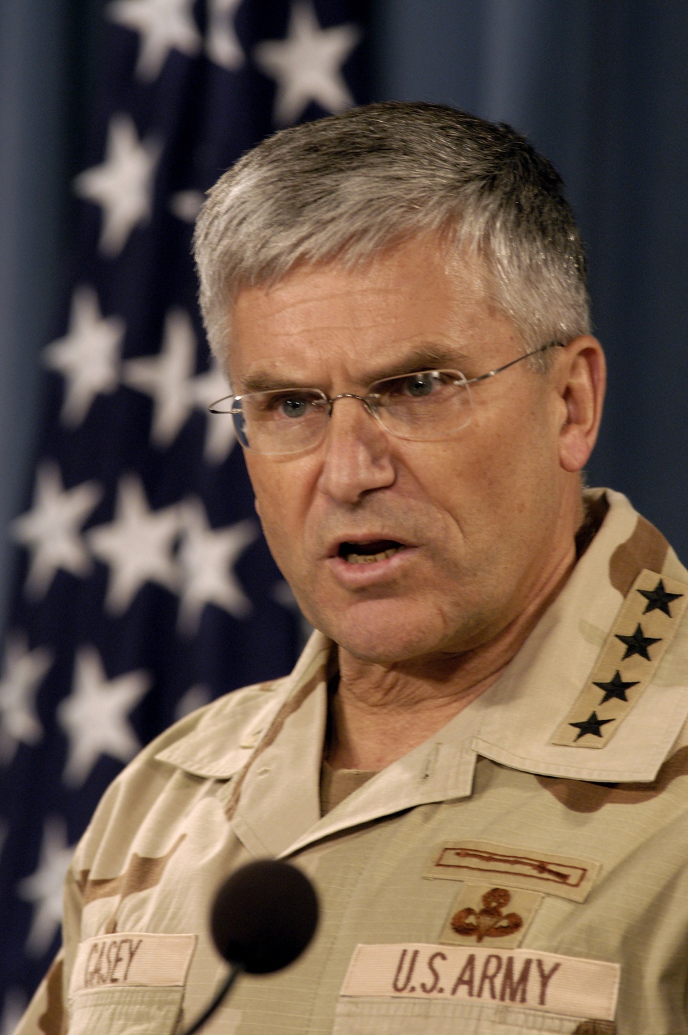 Gen. George W. Casey Jr. answers a reporter's question during an operational update on Iraq.