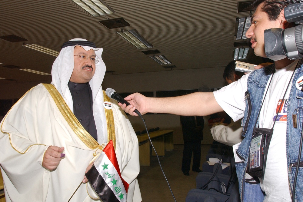 Iraqi President Ghazi al-Yawar speaks with reporters.